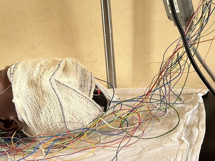 The patient at rest while the machine is detecting the problem