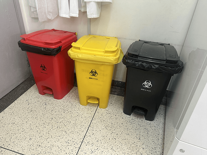 Black, Yellow and Red Medical Bins for waste segregation