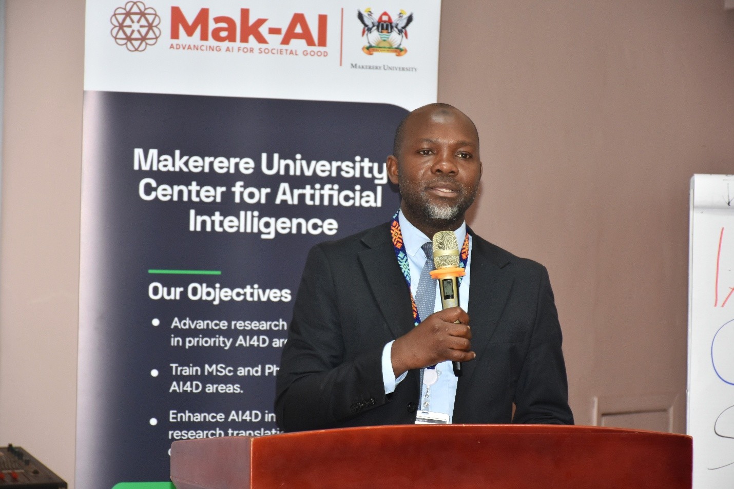 Dr. Abudu Waiswa, a representative from the Uganda Communications Commission (UCC), speaking