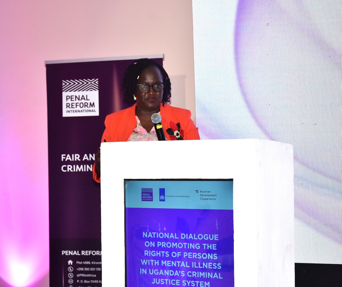 Dr. Patricia Atim, a lecturer at Makerere University’s School of Law and member of the Public Interest Law Clinic speaking during the National Dialogue.
